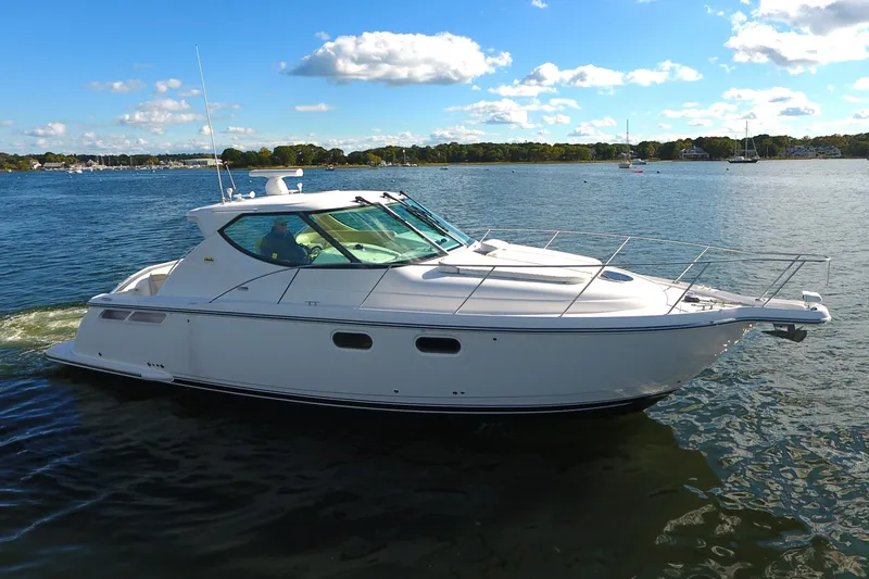 Slide: The Image of 2008 Tiara Yachts 3900 Sovran cruising on a sunny day. - 7