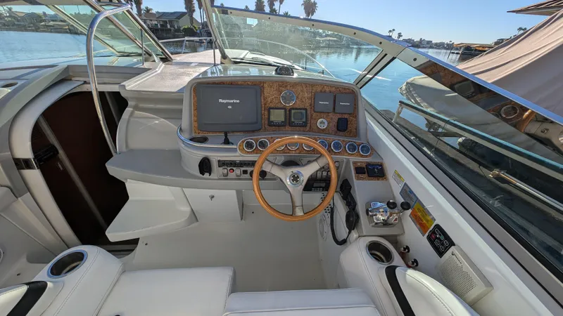 Slide: The Image of 2007 Formula 400ss boat cockpit with steering wheel and navigation controls. - 12