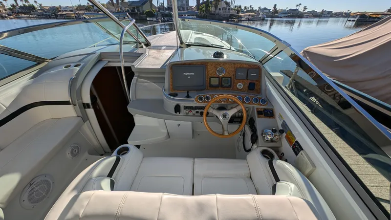 Slide: The Image of 2007 Formula 400ss boat cockpit with luxurious seating and modern dashboard controls. - 13