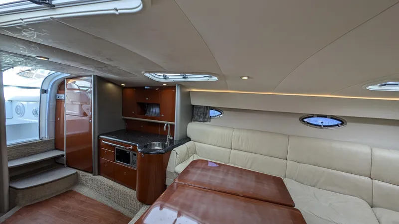 Slide: The Image of Luxurious interior of 2007 Formula 400ss yacht with kitchen and seating area. - 18