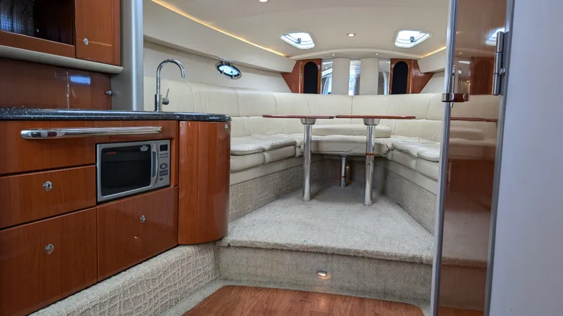 Slide: The Image of Luxurious interior of 2007 Formula 400ss yacht with modern kitchen and seating area. - 21