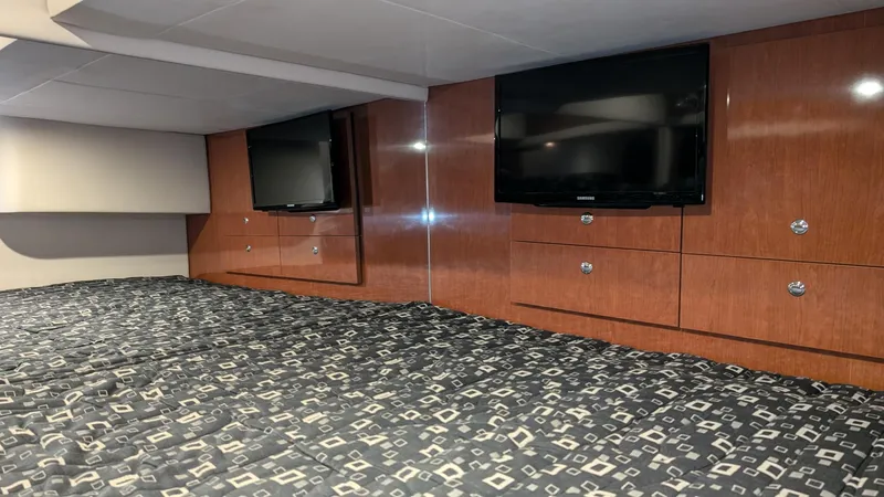 Slide: The Image of Interior of 2007 Formula 400ss boat with TV and wood paneling. - 28