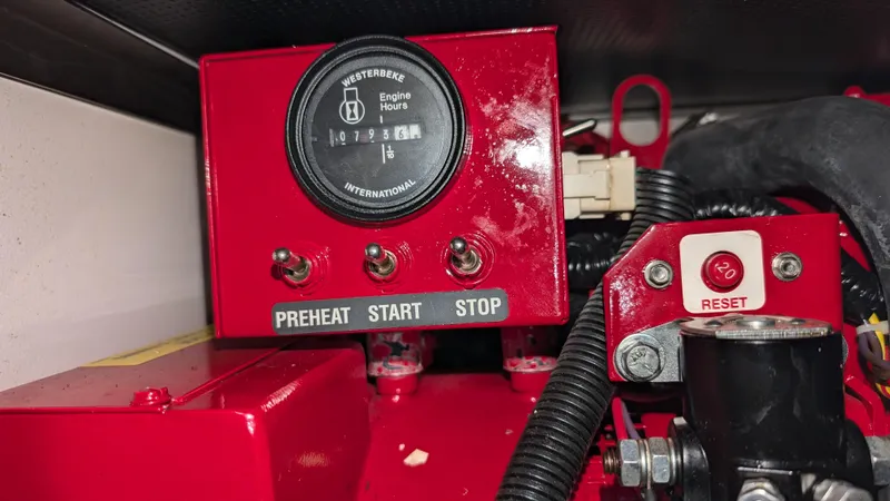 Slide: The Image of Red control panel with preheat, start, stop buttons on a 2007 Formula 400ss. - 33
