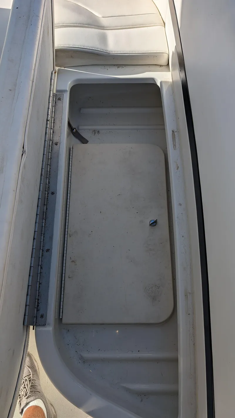 Slide: The Image of Open storage compartment on a 2007 Formula 400ss boat. - 35