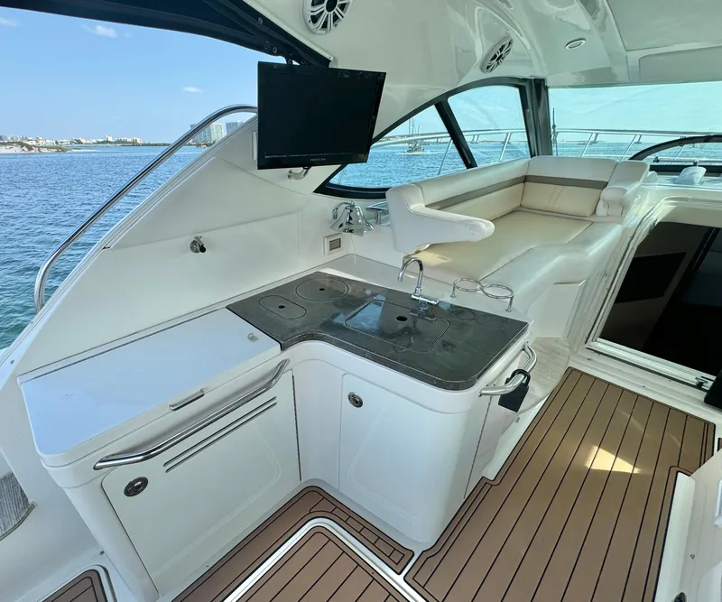 Slide: The Image of Luxurious 2013 Sea Ray 410 Sundancer yacht interior with sleek design and modern amenities. - 12