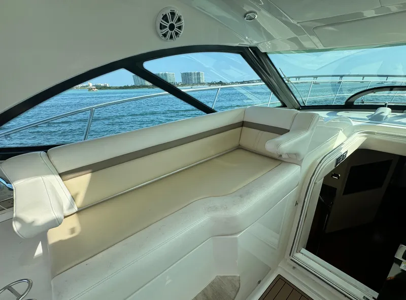 Slide: The Image of Interior view of 2013 Sea Ray 410 Sundancer yacht with ocean backdrop. - 13