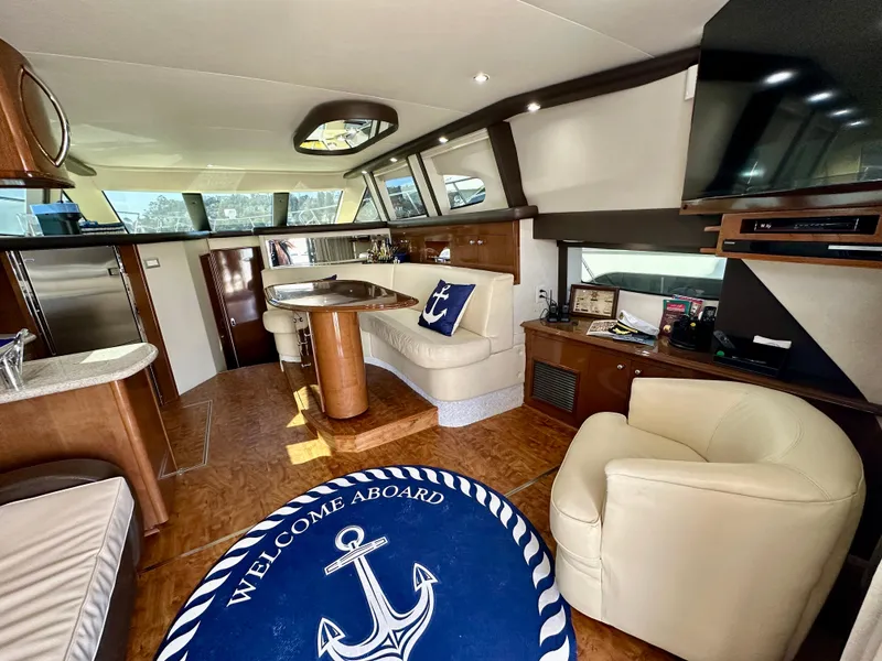 Slide: The Image of Luxurious interior of 2008 Carver 43 Super Sport yacht with elegant seating and decor. - 19