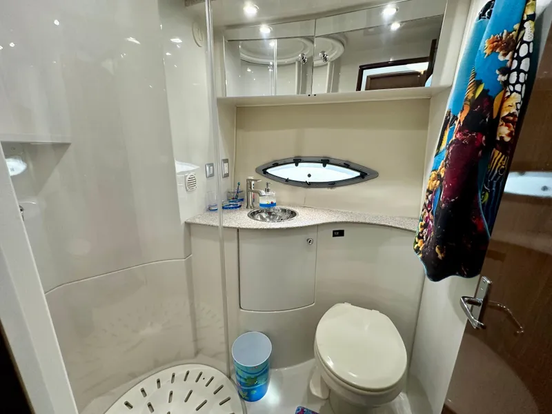 Slide: The Image of Bathroom interior of 2008 Carver 43 Super Sport yacht, featuring modern fixtures and compact design. - 30