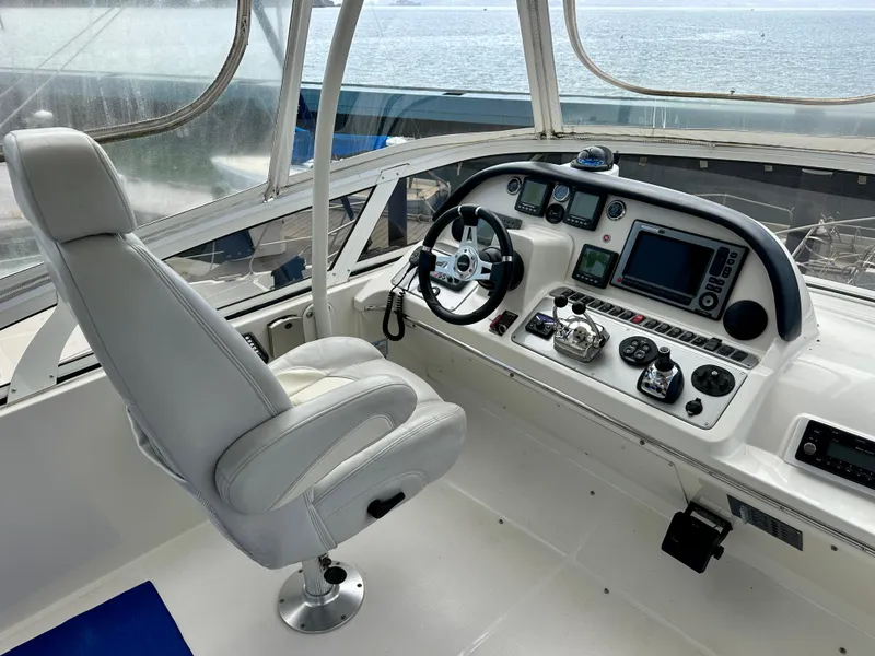 Slide: The Image of 2008 Carver 43 Super Sport helm with modern navigation equipment and captain's chair. - 6