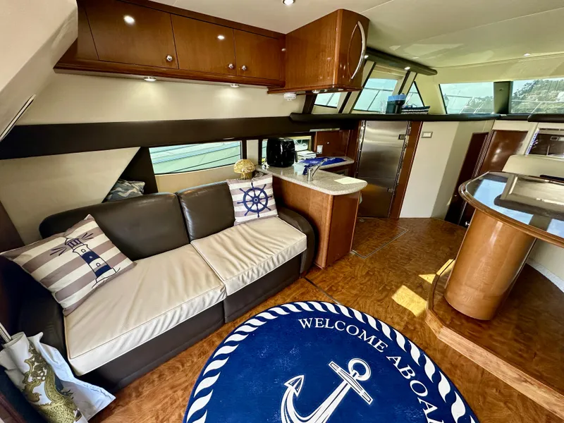 Slide: The Image of Interior of 2008 Carver 43 Super Sport yacht with modern furnishings and nautical decor. - 20