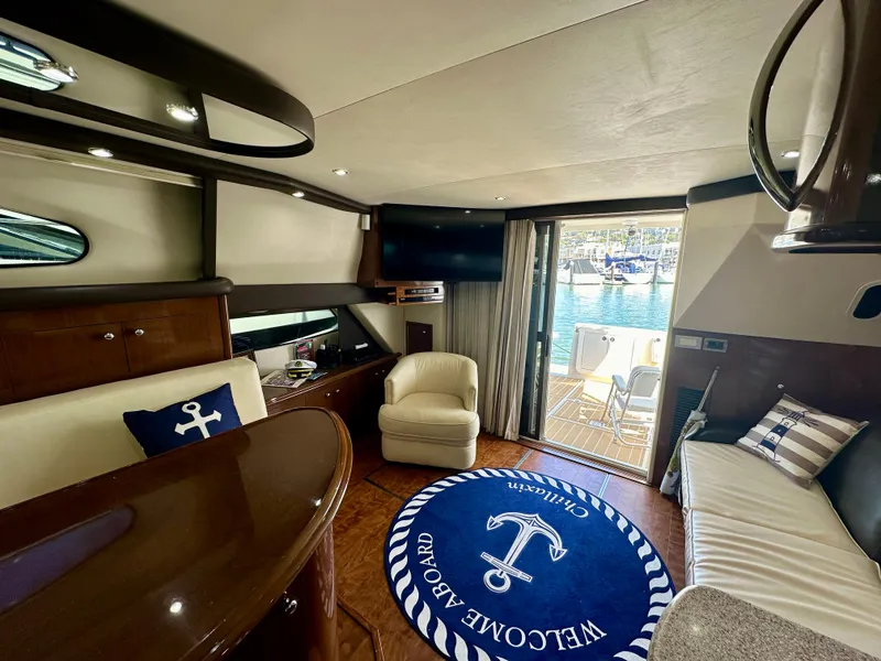 Slide: The Image of Luxurious interior of 2008 Carver 43 Super Sport yacht with nautical decor. - 23