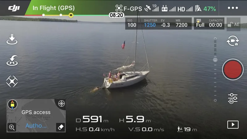 Slide: The Image of Aerial view of 1988 O'Day 27' LE sailboat on calm water, captured by drone. - 7