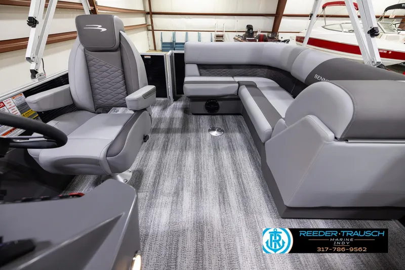 Slide: The Image of 2025 Bennington 188 SLS boat interior with gray seating and modern design. - 13