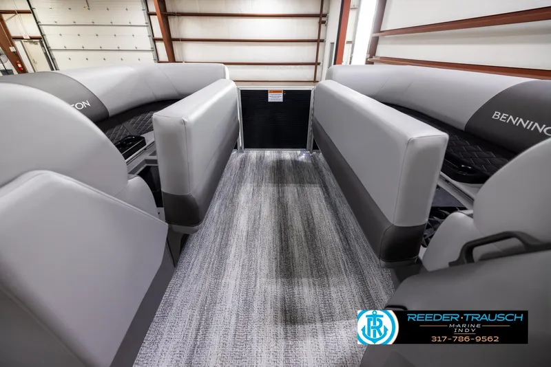 Slide: The Image of 2025 Bennington 188 SLS pontoon boat interior with gray seating and flooring. - 17