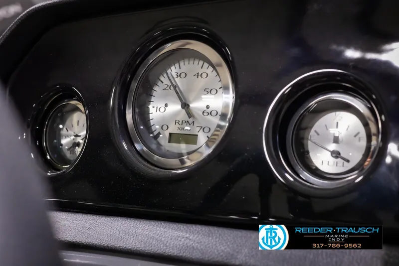 Slide: The Image of Close-up of 2025 Bennington 188 SLS dashboard gauges. - 29