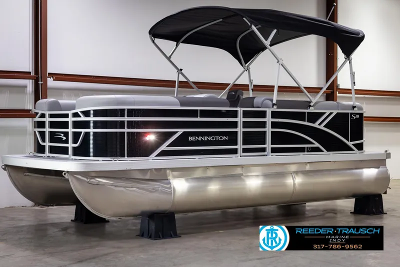 Slide: The Image of 2025 Bennington 188 SLS pontoon boat with canopy in showroom. - 3