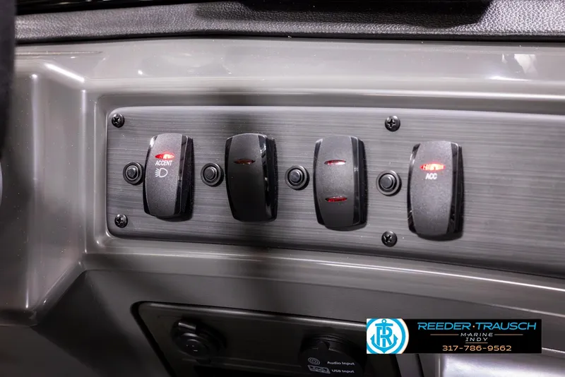 Slide: The Image of Control panel of 2025 Bennington 188 SLS boat with labeled switches. - 31