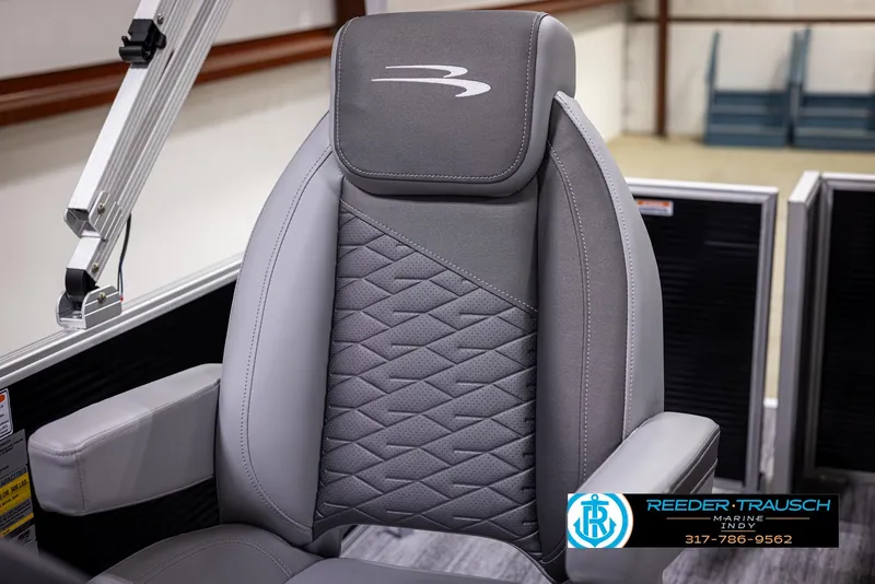 Slide: The Image of 2025 Bennington 188 SLS boat seat with gray upholstery and logo detailing. - 33