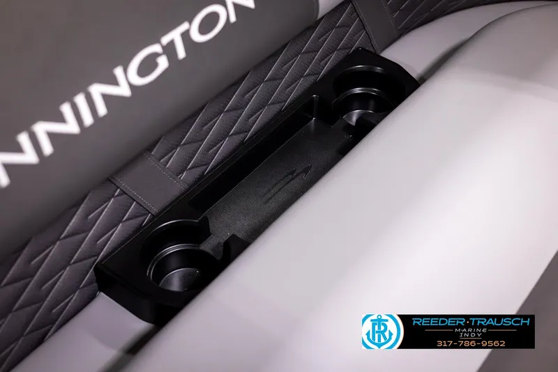 Slide: The Image of 2025 Bennington 188 SLS boat interior with cup holders and quilted seating. - 35