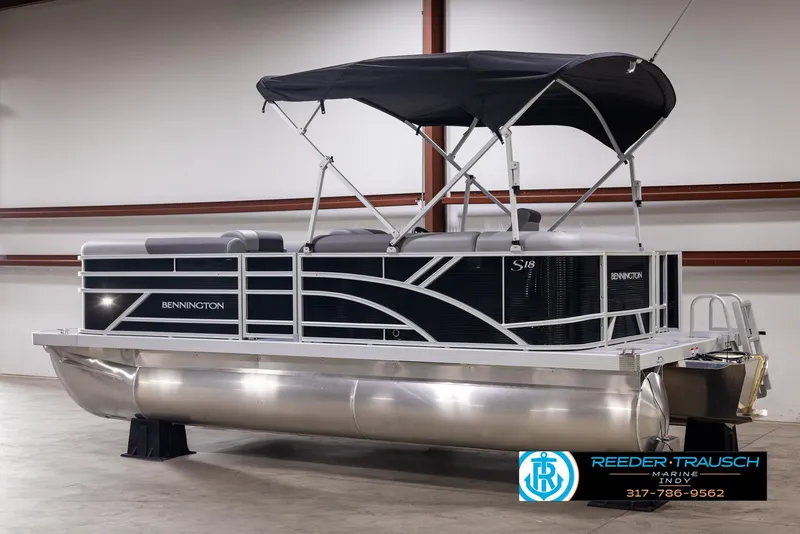 Slide: The Image of 2025 Bennington 188 SLS pontoon boat with canopy in showroom. - 5