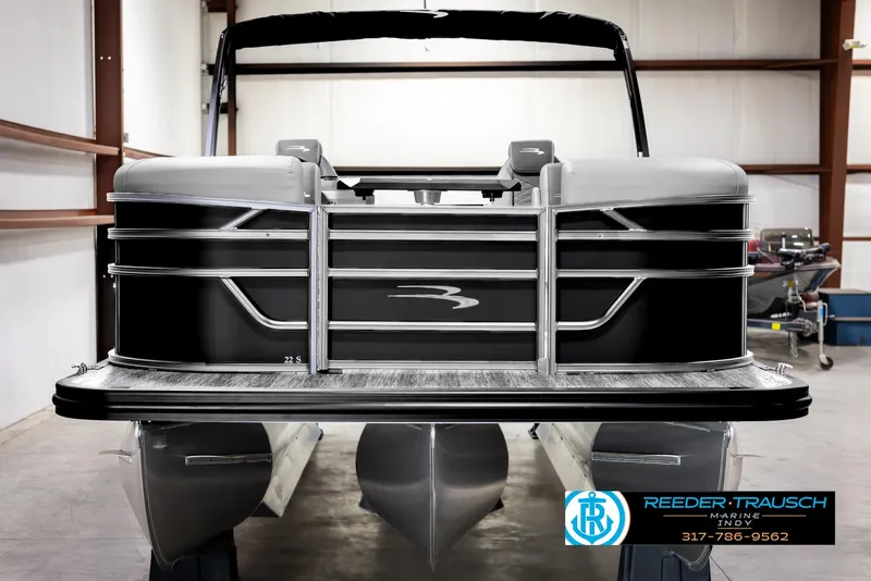 Slide: The Image of 2025 Bennington 188 SLS pontoon boat in showroom, front view. - 7
