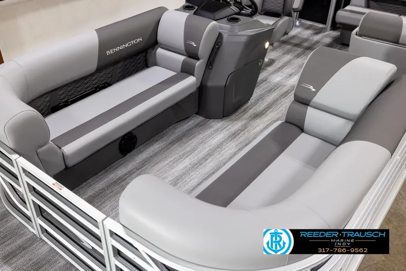 Slide: The Image of 2025 Bennington 188 SLS pontoon boat interior with gray seating and modern design. - 8