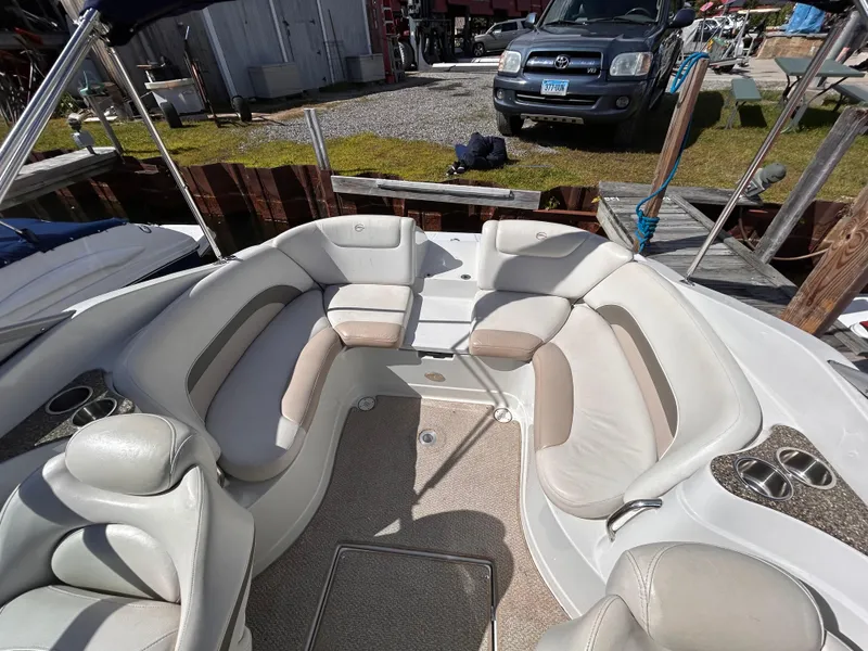 Slide: The Image of 2007 Crownline 255 CCR boat with spacious seating and modern design. - 10