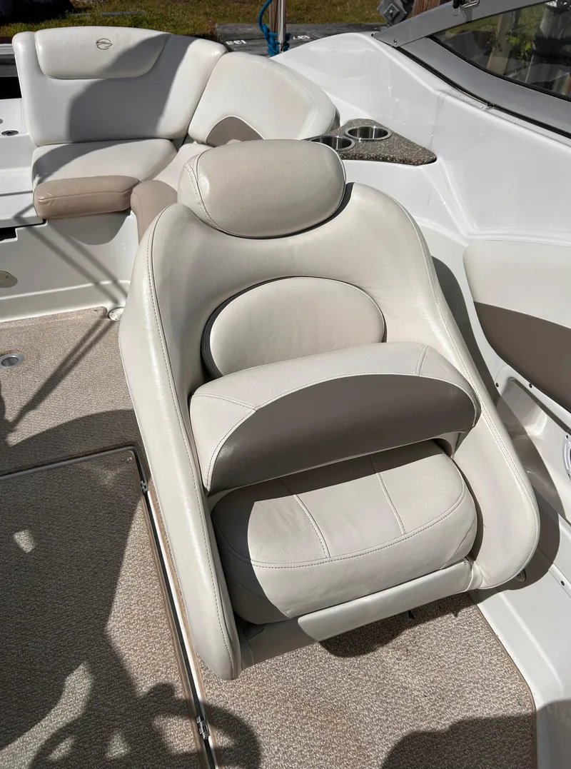 Slide: The Image of 2007 Crownline 255 CCR boat interior with plush seating and modern design. - 28