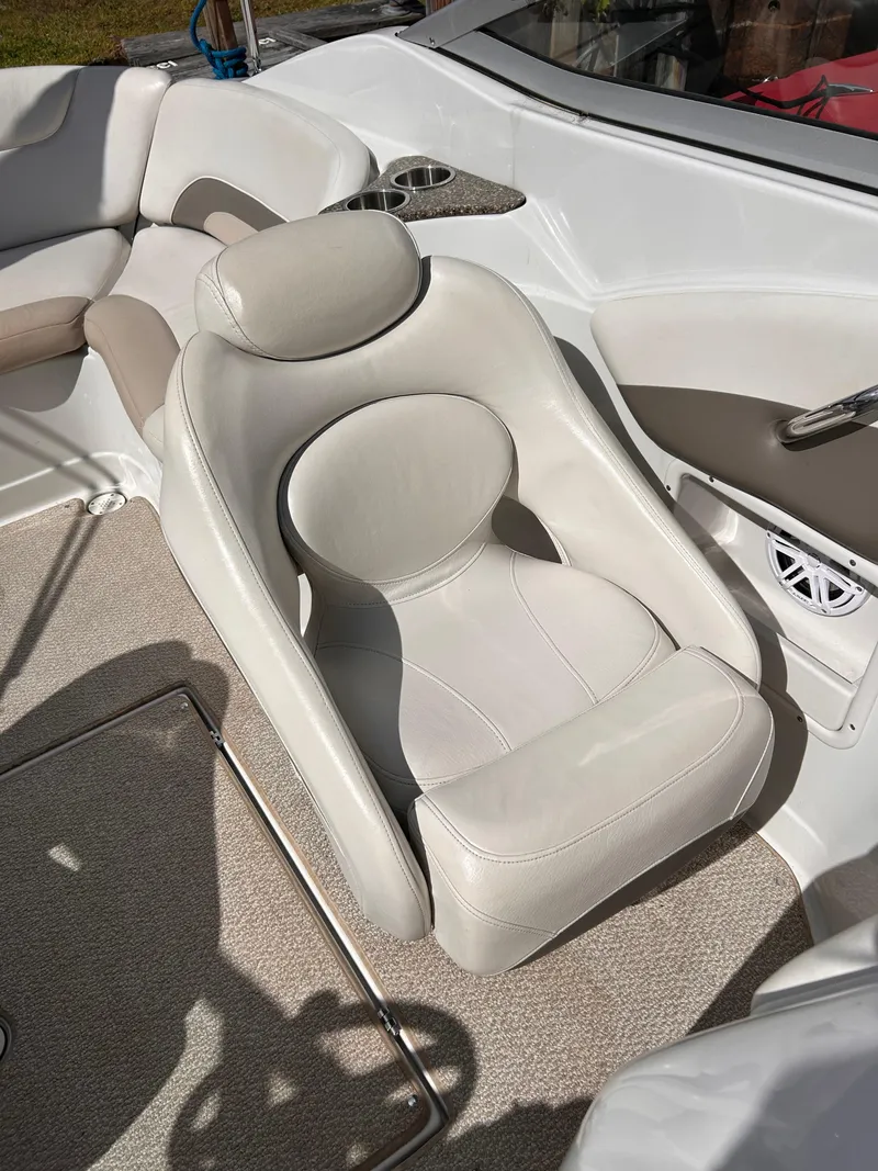 Slide: The Image of 2007 Crownline 255 CCR boat interior with white leather seating. - 29