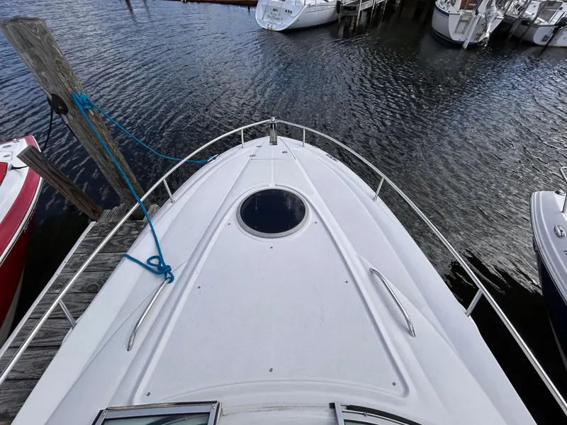 Slide: The Image of 2007 Crownline 255 CCR boat docked at marina, top view. - 35