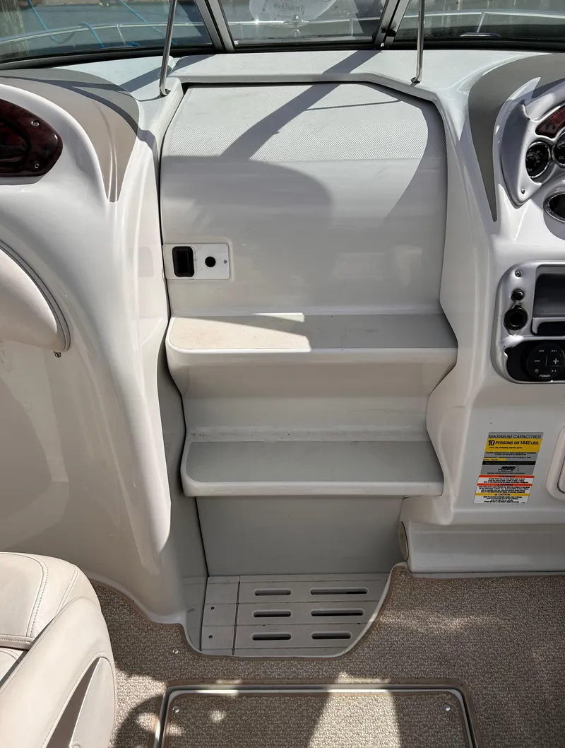 Slide: The Image of 2007 Crownline 255 CCR boat interior with dashboard and seating area. - 36