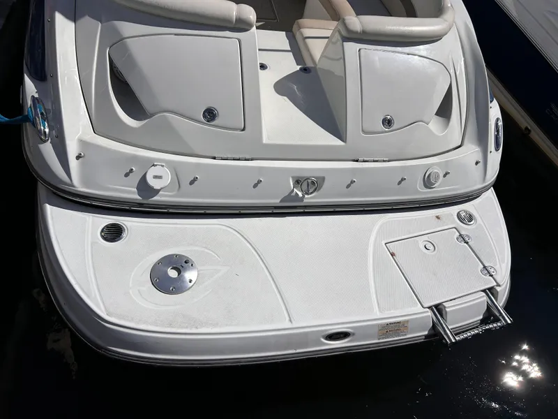 Slide: The Image of 2007 Crownline 255 CCR boat stern with swim platform and ladder. - 6
