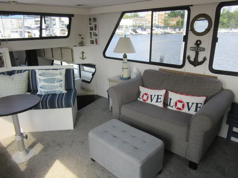 Slide: The Image of Cozy interior of 1995 Gibson 44 Classic houseboat with nautical decor and waterfront view. - 35