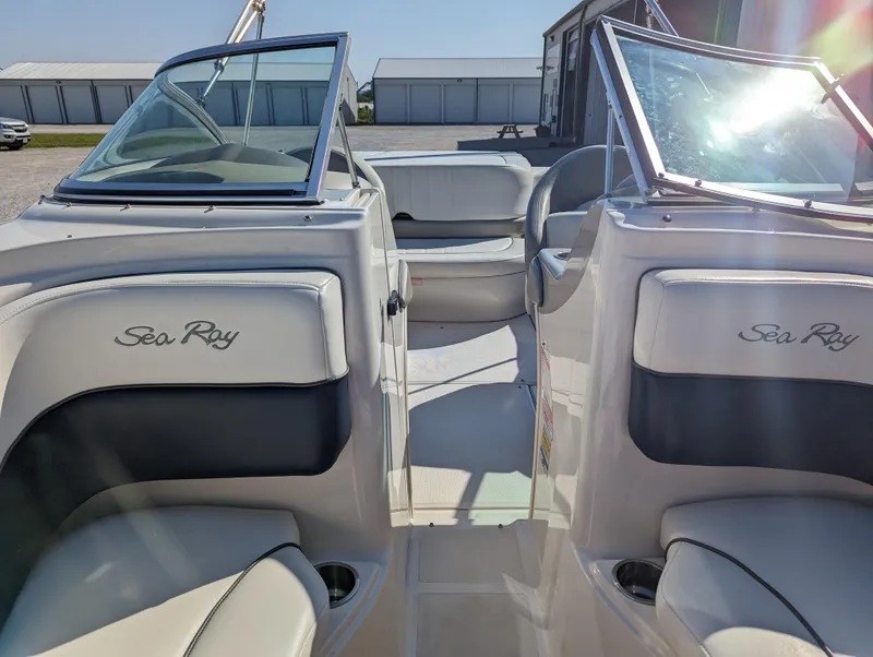 Slide: The Image of 2006 Sea Ray 200 Select boat interior with seating and windshield. - 9