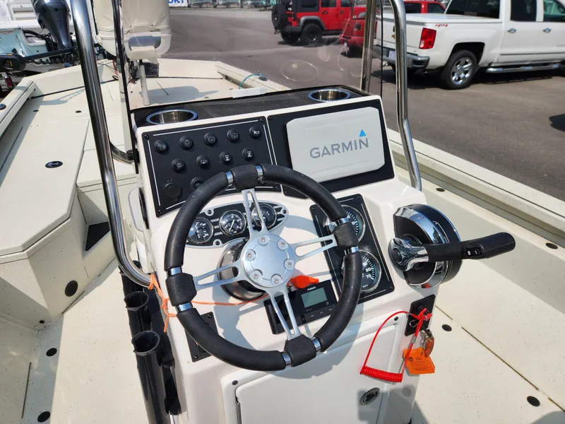 Slide: The Image of 2022 Ranger RB200 boat console with Garmin navigation system and steering wheel. - 16