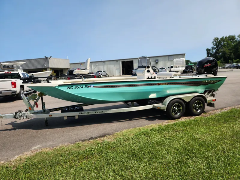 Slide: The Image of 2022 Ranger RB200 boat on trailer, parked outdoors. - 3