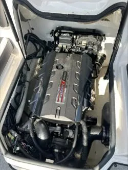 Slide: The Image of 2019 Yamaha SX195 boat engine compartment, showcasing powerful motor and components. - 11