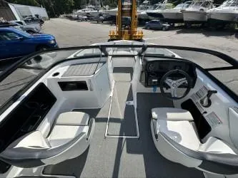 Slide: The Image of 2019 Yamaha Boats SX195 interior with sleek design and modern dashboard. - 12