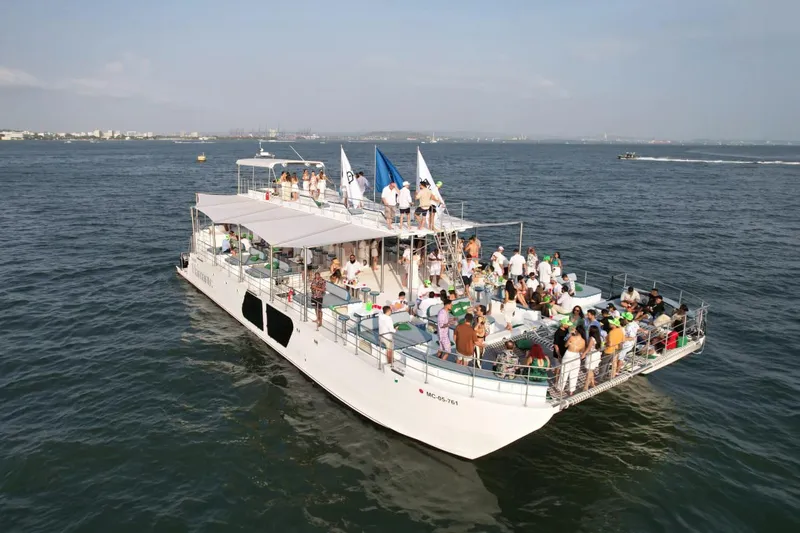 The Image of Large party on Custom PaxCat 80 yacht, 2024, sailing on open water. - 0