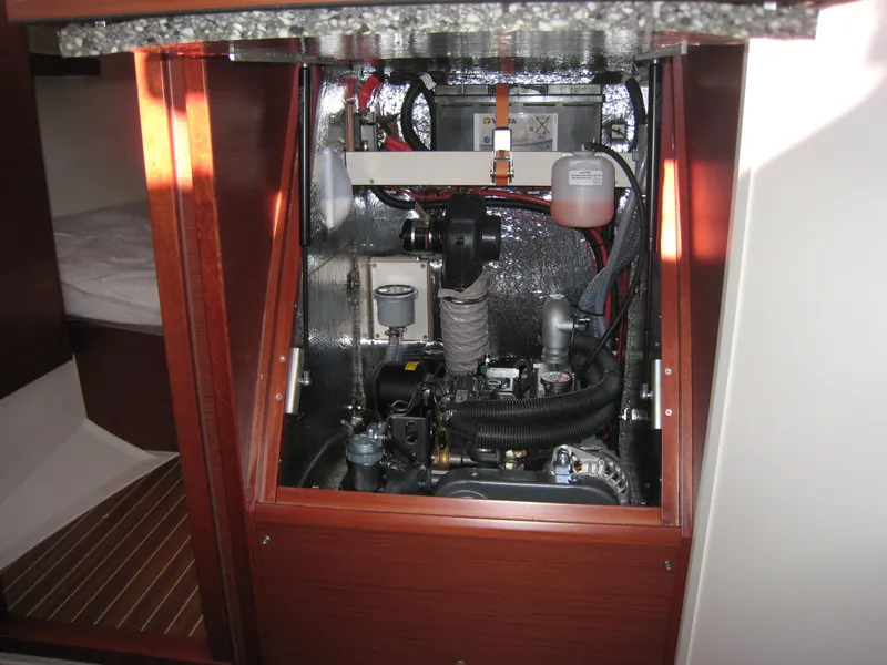 Slide: The Image of Engine compartment of 2025 Hanse 348 yacht, showcasing mechanical components and insulation. - 4