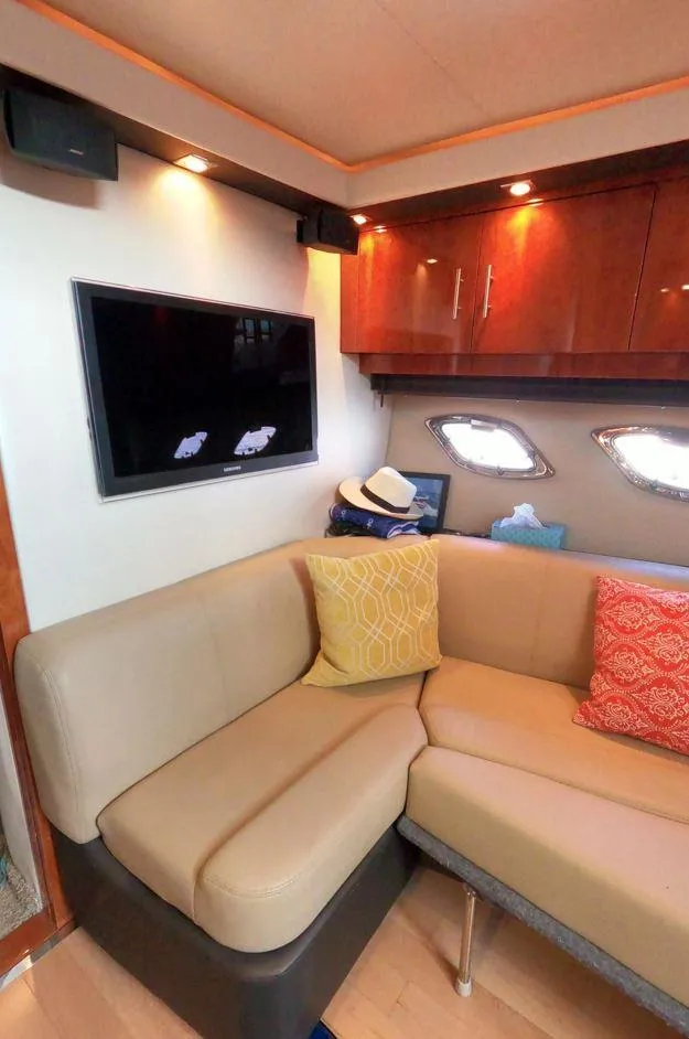 Slide: The Image of Luxurious interior of 2011 Regal 42 Sport Coupe with cozy seating and modern decor. - 36