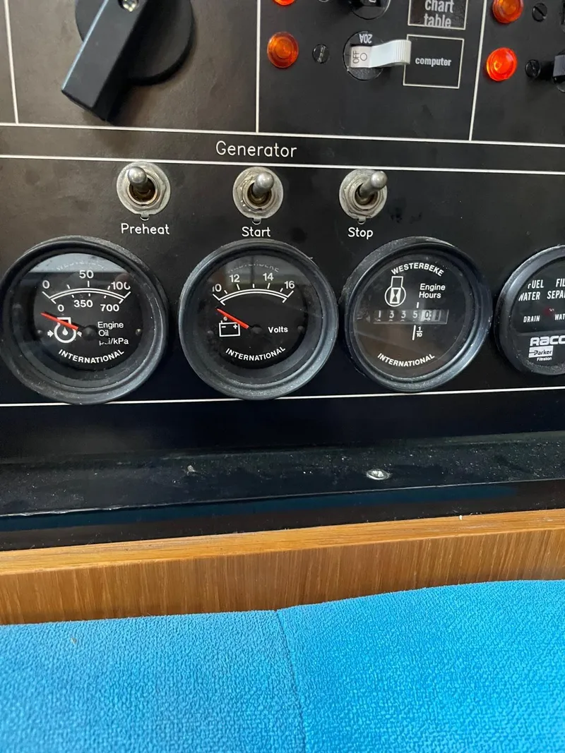 Slide: The Image of Control panel of a 2003 Oyster 53 yacht with gauges and switches. - 17