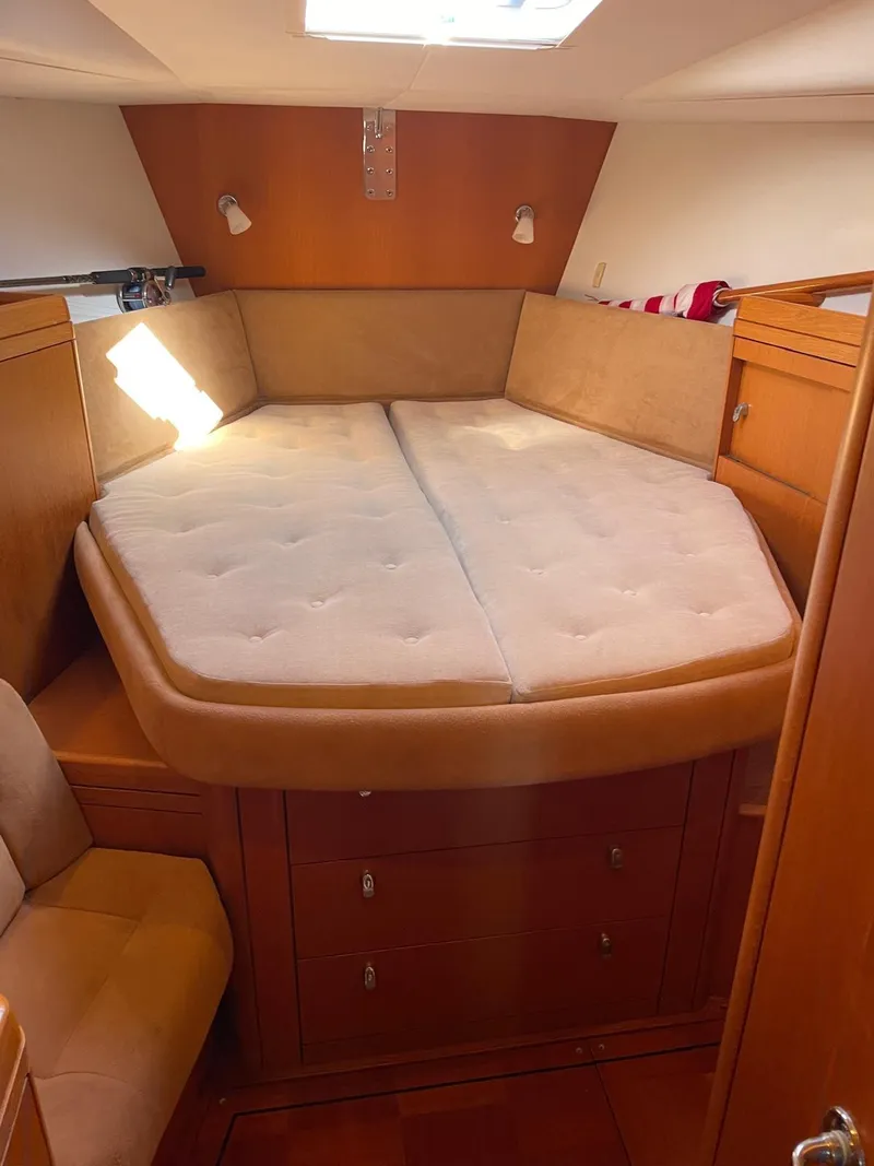 Slide: The Image of Luxurious cabin interior of 2003 Oyster 53 yacht with comfortable bedding. - 27