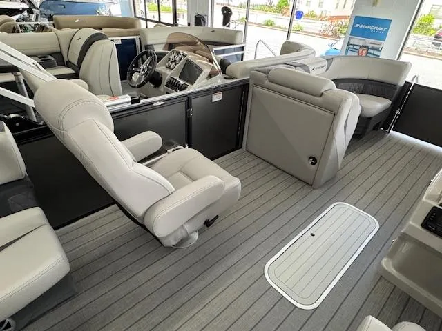 Slide: The Image of 2025 Starcraft SLS 1 boat interior with luxurious seating and modern dashboard. - 13