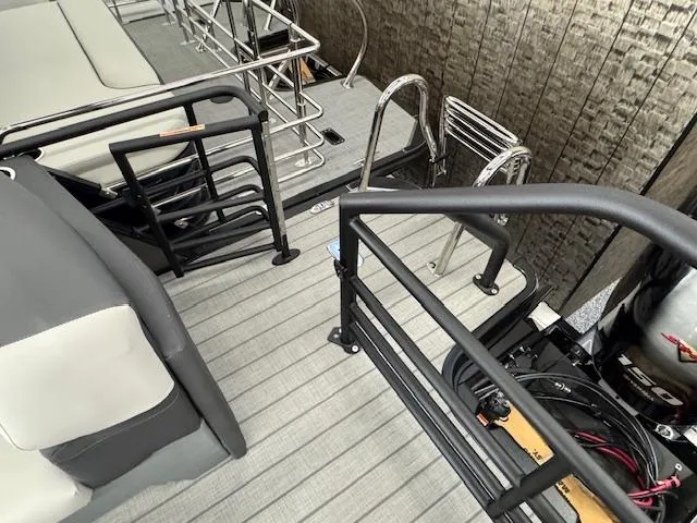 Slide: The Image of 2025 Starcraft SLS 1 boat interior with sleek seating and modern railing design. - 19