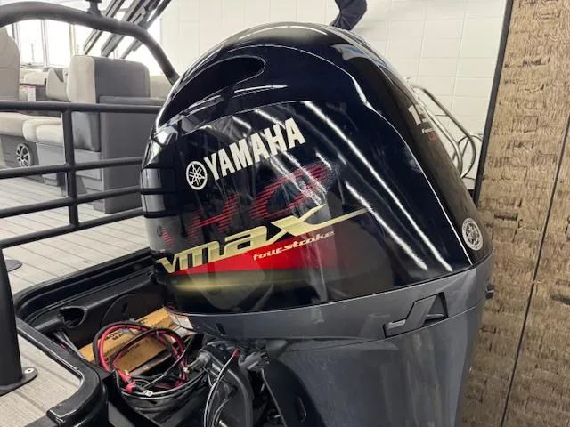 Slide: The Image of Yamaha VMAX outboard motor on 2025 Starcraft SLS 1 boat, indoor setting. - 23