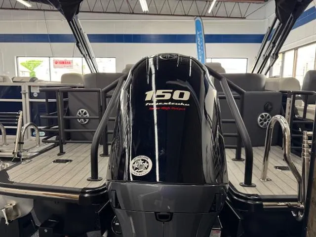 Slide: The Image of 2025 Starcraft SLS 1 boat with 150 horsepower engine in showroom. - 24