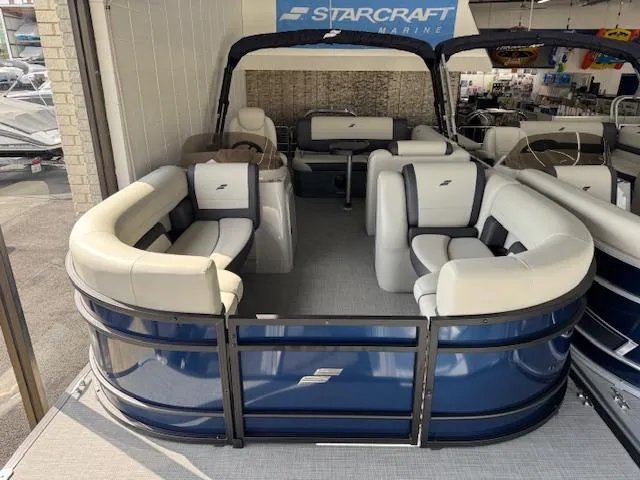 Slide: The Image of 2025 Starcraft EXS 3 Q pontoon boat with spacious seating and sleek design. - 4