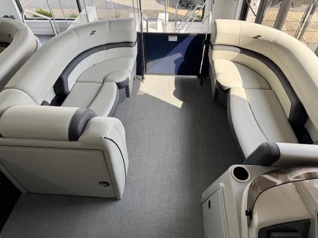 Slide: The Image of Luxurious interior of 2025 Starcraft EXS 3 Q boat with plush seating. - 5