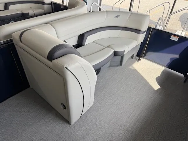Slide: The Image of Luxurious seating in 2025 Starcraft EXS 3 Q boat interior. - 6